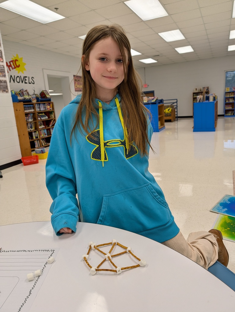 Students with their snowflake replicas.