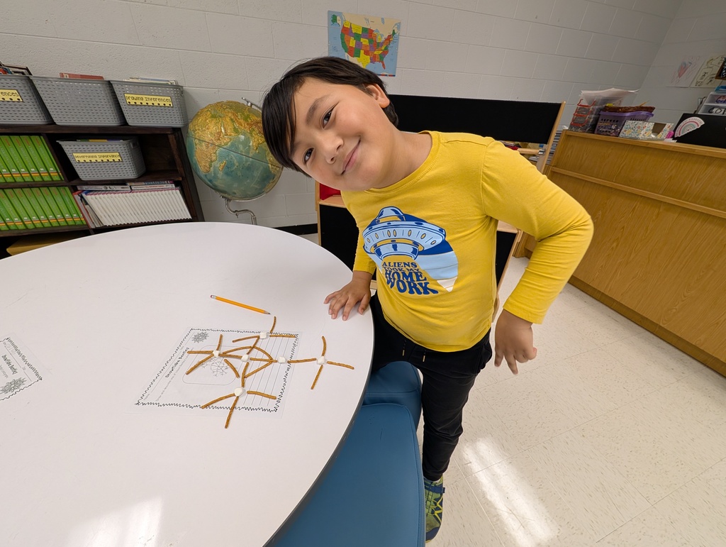 Students with their snowflake replicas.