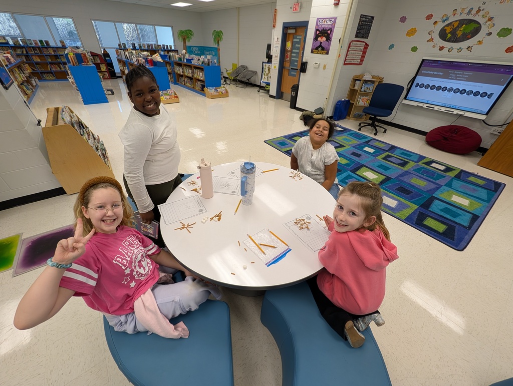 Students with their snowflake replicas.