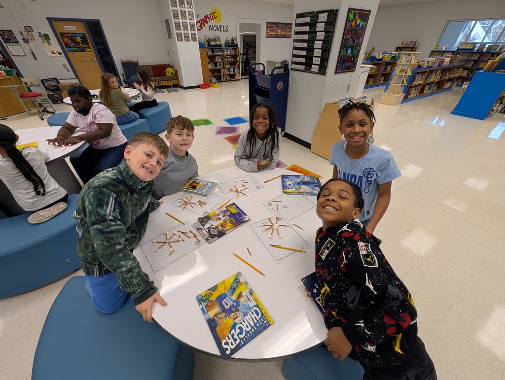 Students with their snowflake replicas.