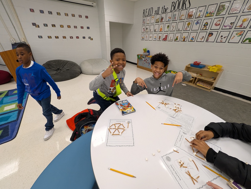 Students with their snowflake replicas.