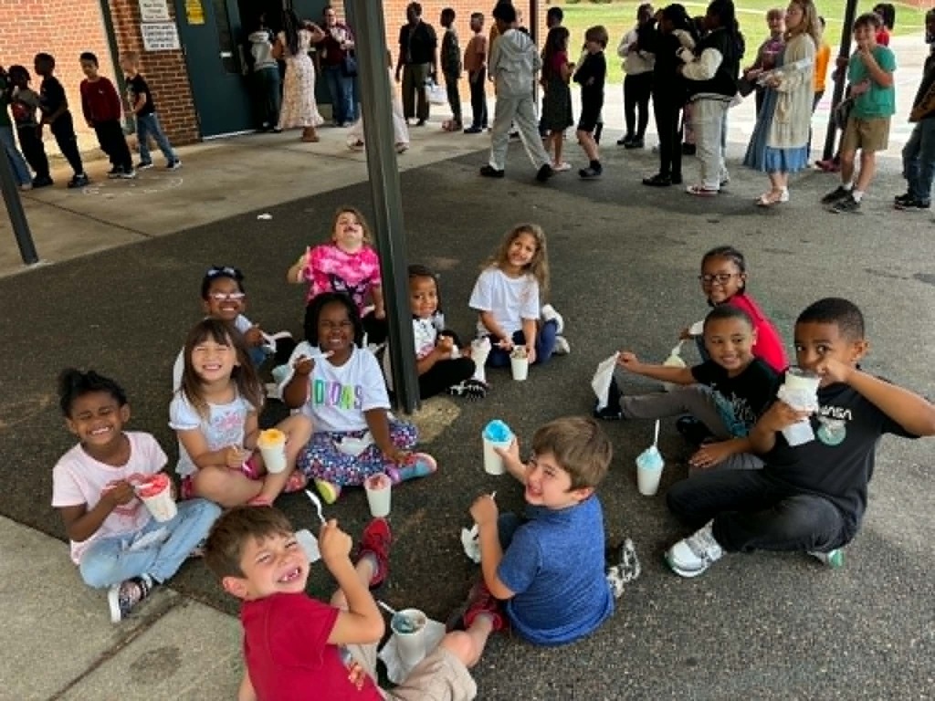 Kindergarten students enjoying Snowie!