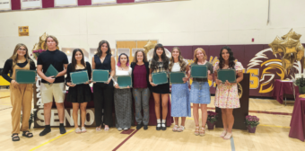 Amy Carlson, Valley Electric’s director of corporate affairs and community relations, presents scholarships to the 2024 winners from Pahrump Valley High School during the awards night.