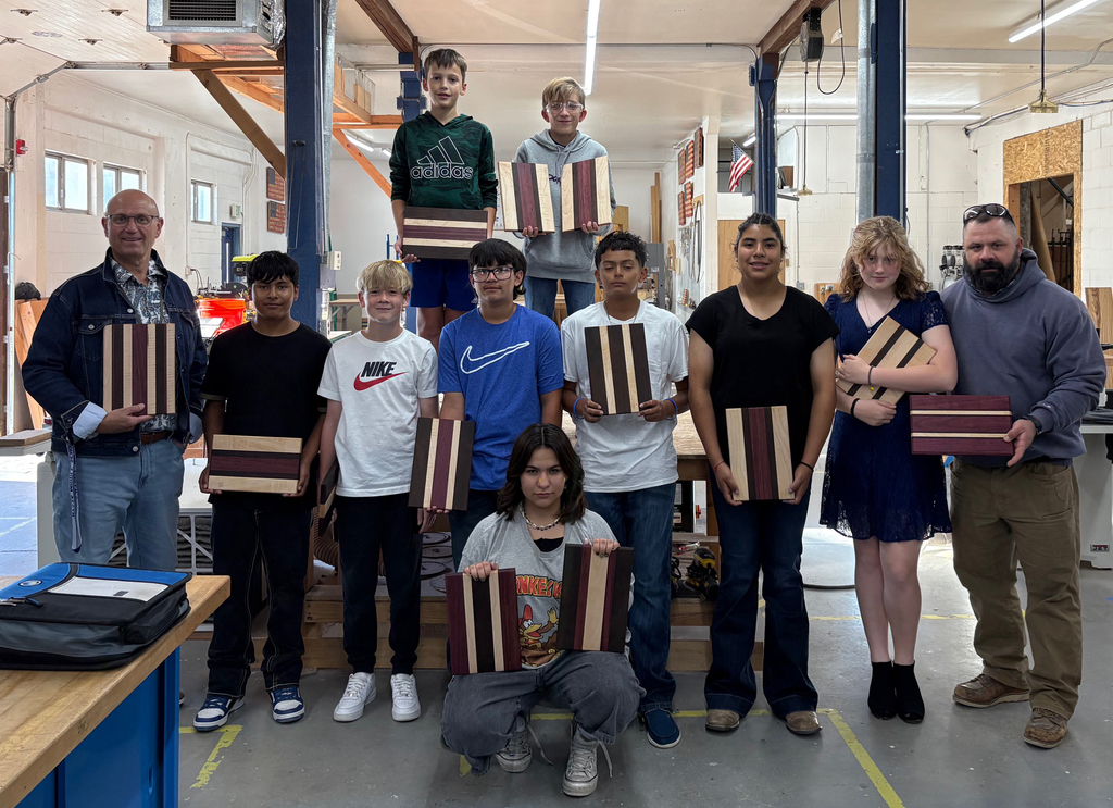 Middle School wood shop class under the direction of Mr. Esplin created beautiful cutting boards that they are displaying.