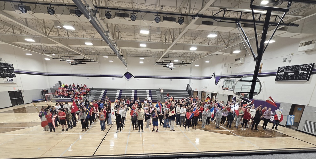 Falcon Times presenting their flags