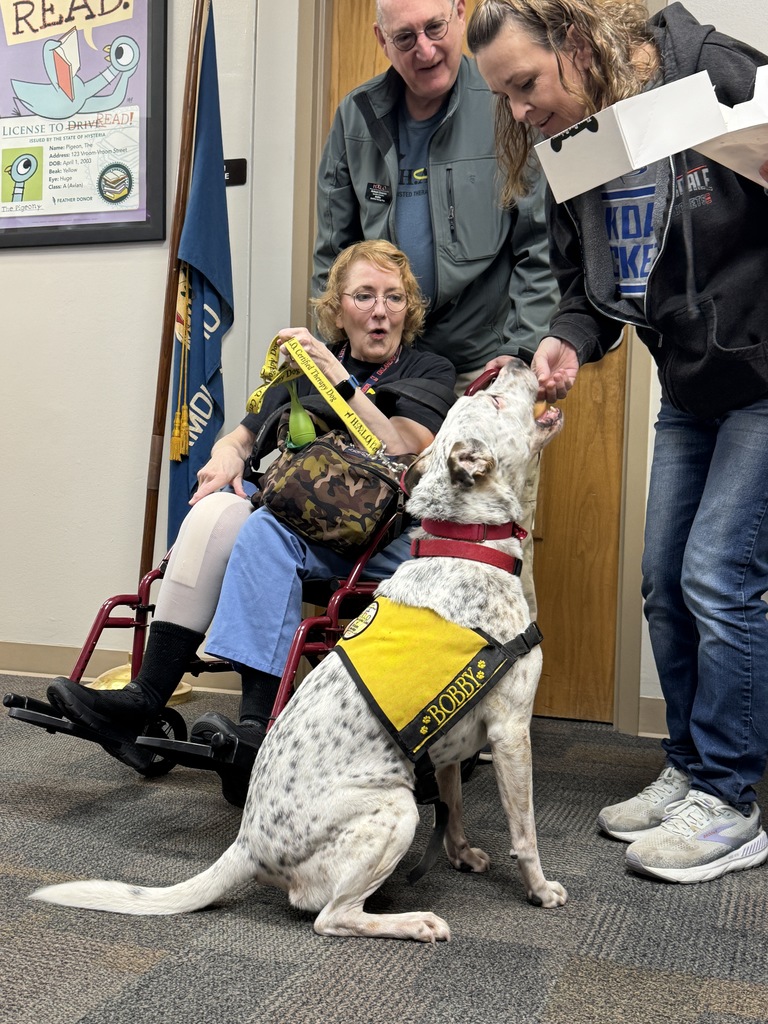 Bobby, therapy dog, visits Oakdale