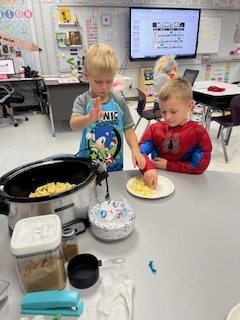 Adding the apples to the crockpot!