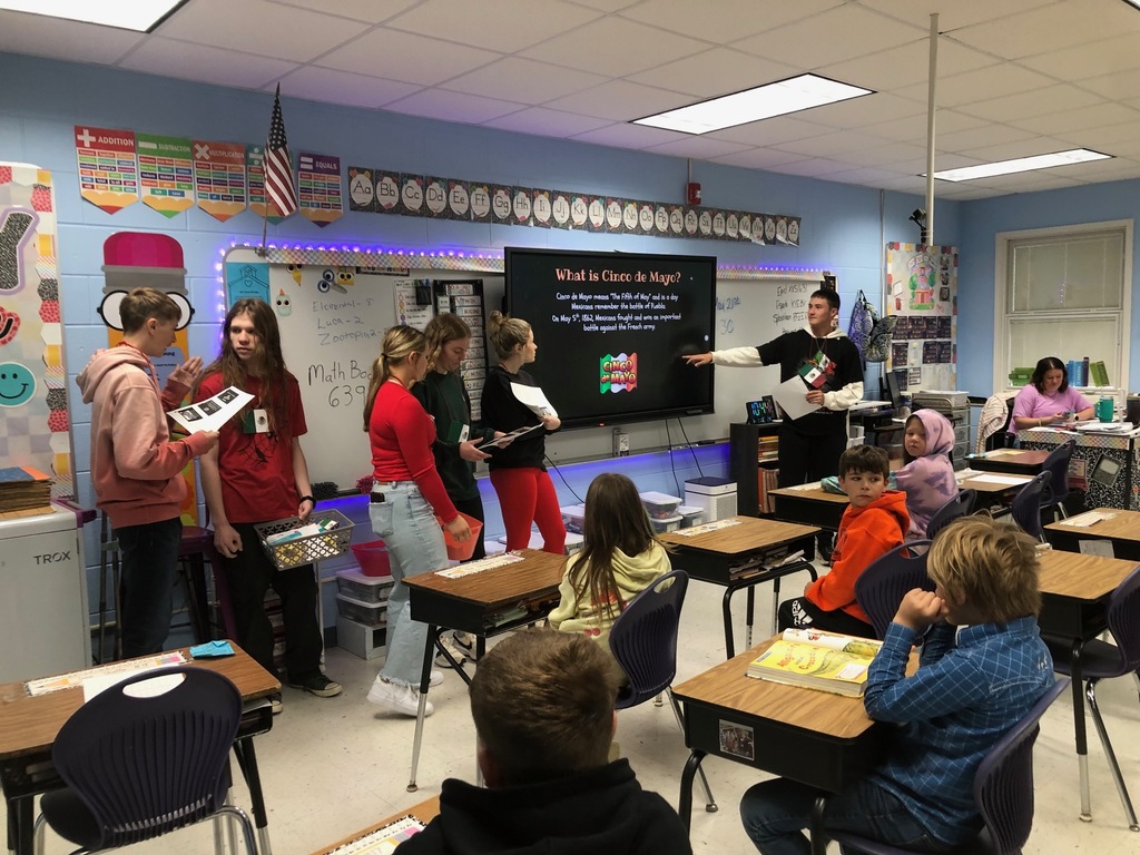 Spanish II presenting to 3rd Grade.