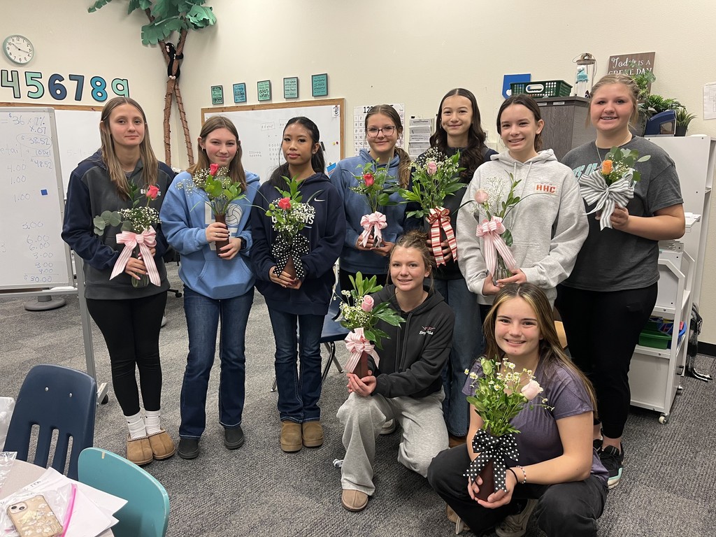 FFA members making flower arrangements.