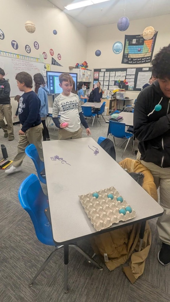 kids throwing ping pong.