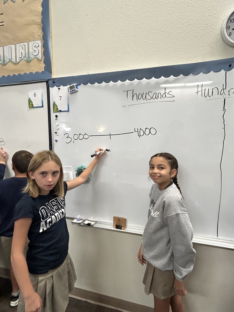 Kids smiling doing math