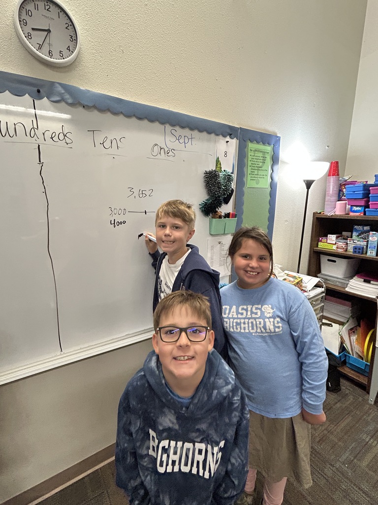 Kids smiling doing math