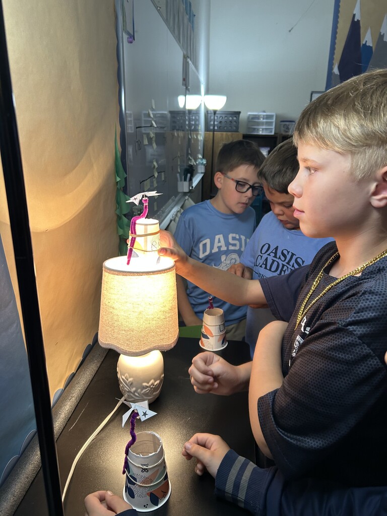 Fourth Graders Doing Heat Experiment