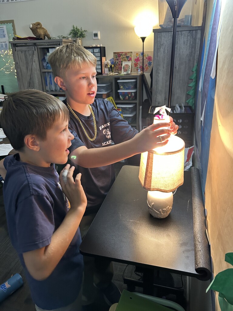 Fourth Graders Doing Heat Experiment