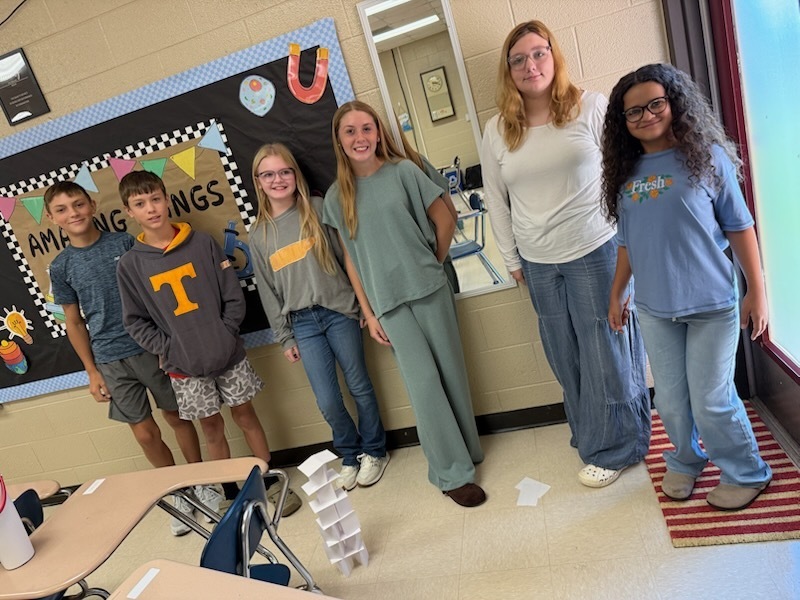 Photo of students participating in group project.