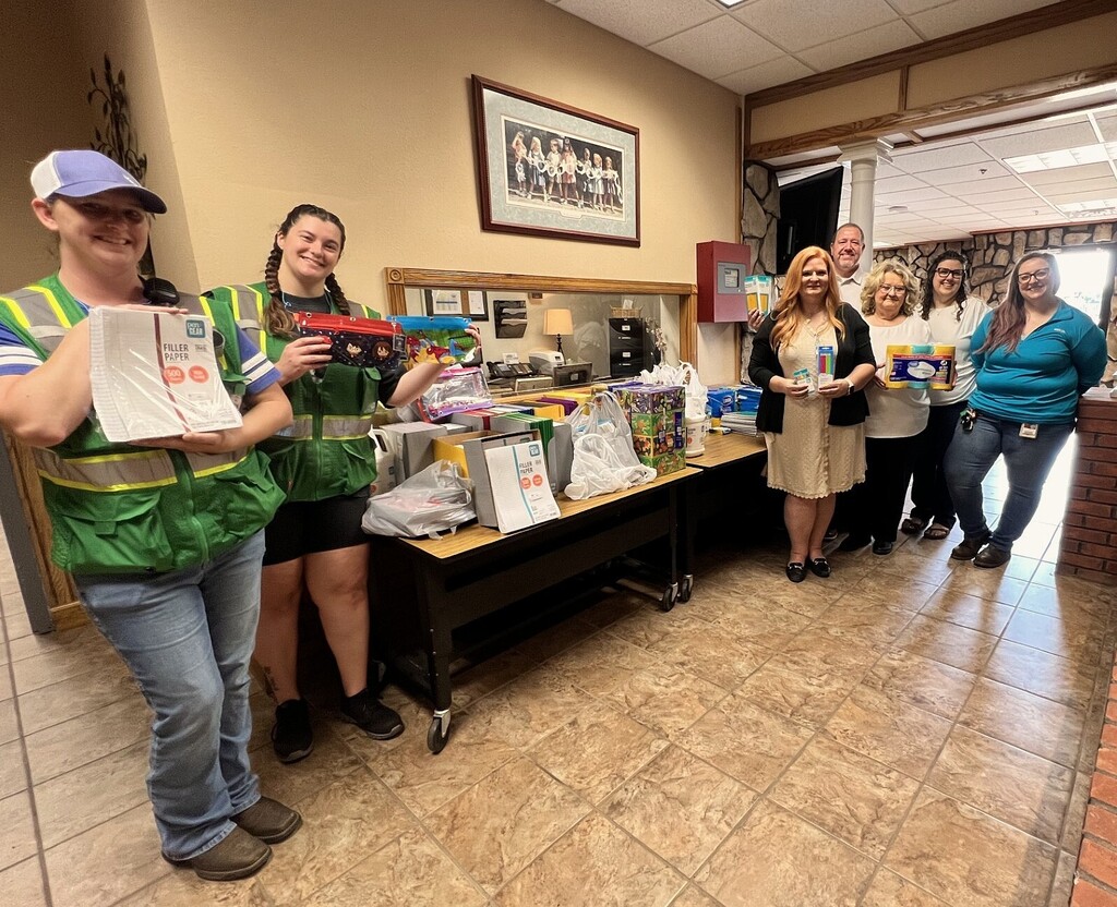 Photo of school supplies being delivered to local school district.