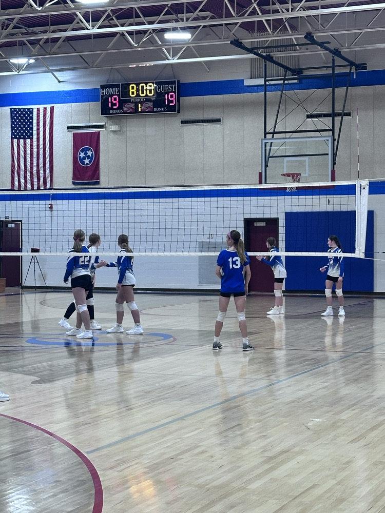 OCMS volleyball players on the court