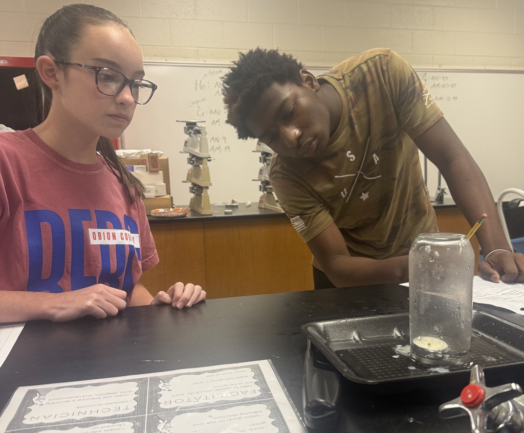 Students in Ms. Demanda’s 7th-grade science class participate in several hands-on experiments exploring states of matter and gas laws. Photos show students working together at lab stations with bottles, balloons, glassware, water, heat, and other classroom science materials while recording and observing their results.