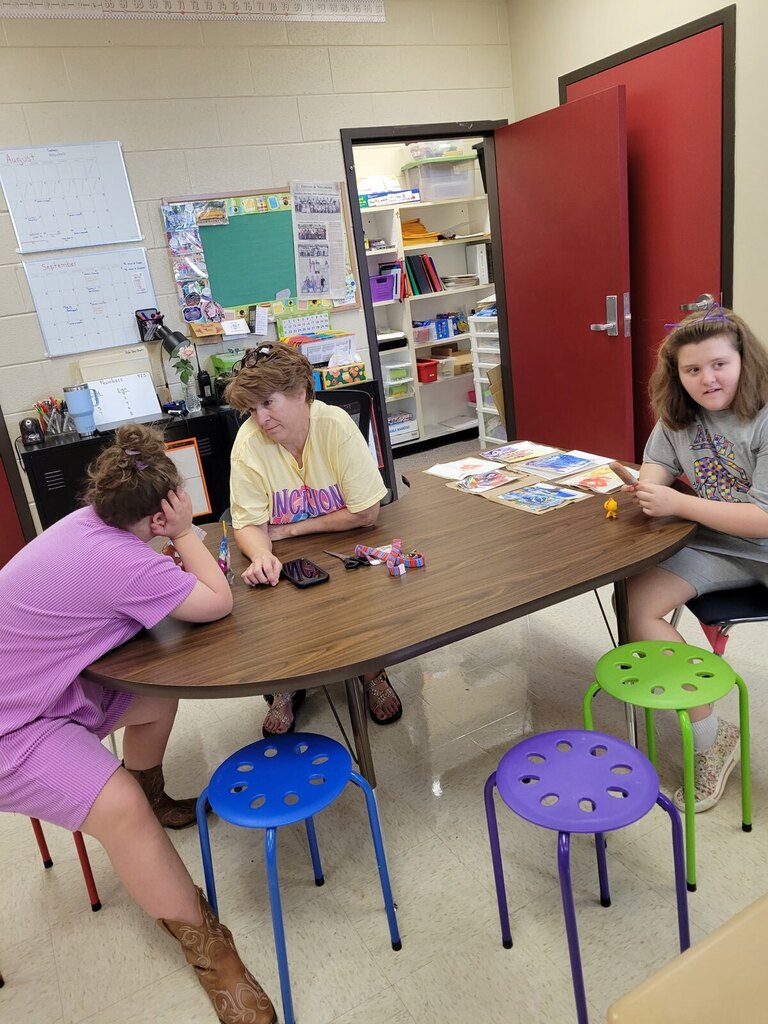 Students in the OCMS ACHIEVE class celebrate Fun Friday after completing their work and showing academic improvement. Photos show students and staff participating in classroom activities and enjoying treats together.