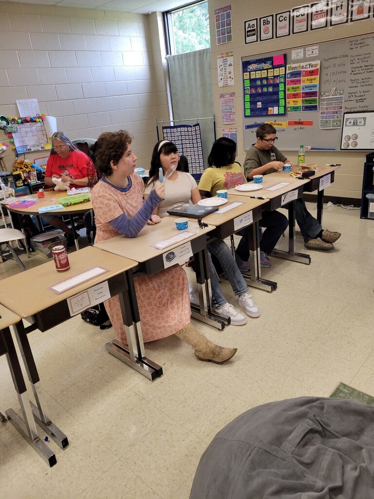 Students in the OCMS ACHIEVE class celebrate Fun Friday after completing their work and showing academic improvement. Photos show students and staff participating in classroom activities and enjoying treats together.