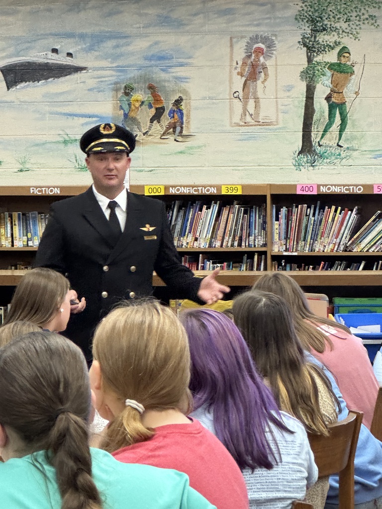 Delta Captain Ben Hager speaking to sitting students!