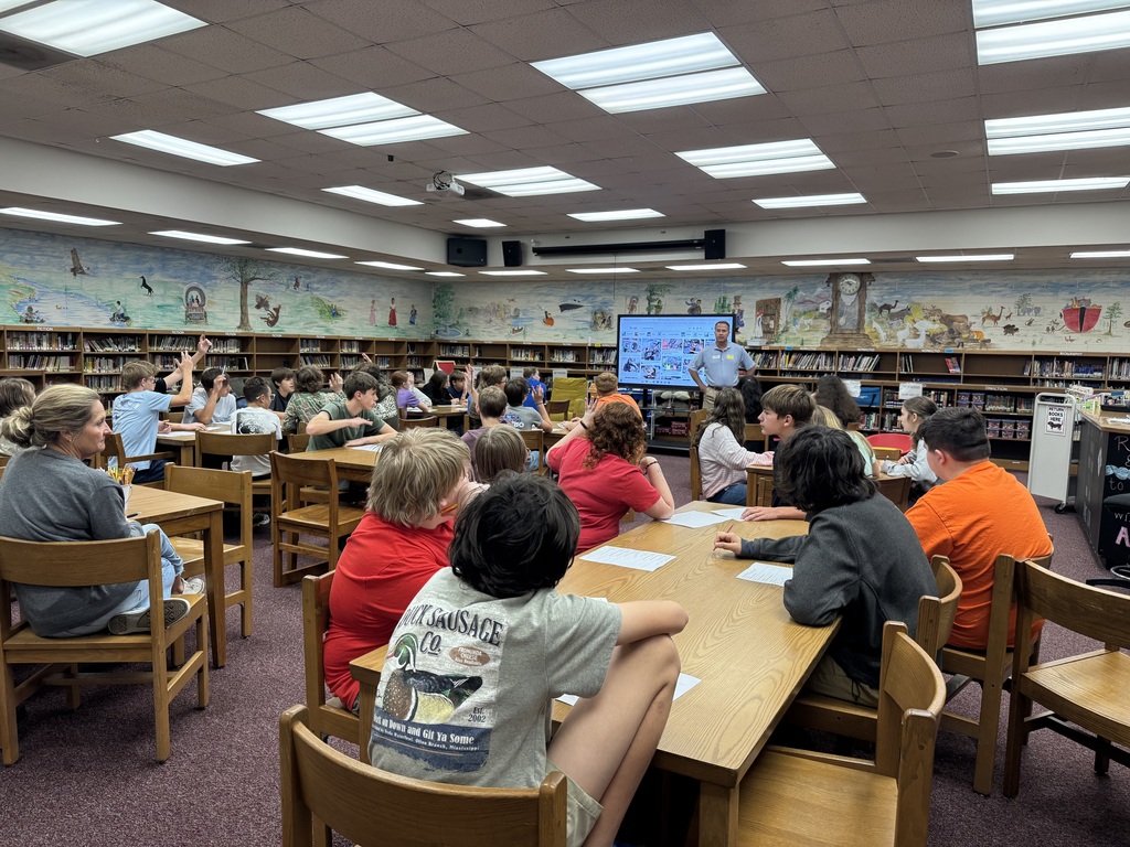 Students sitting and listening to Dr. Frakes.