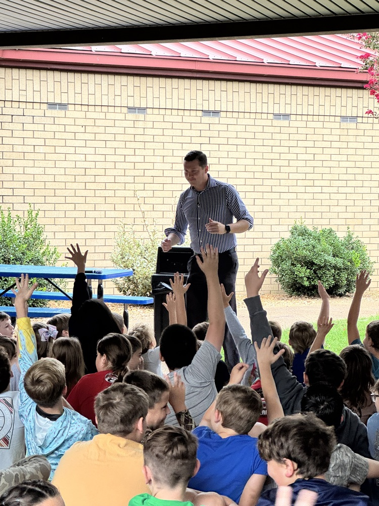 students sitting in a crowd