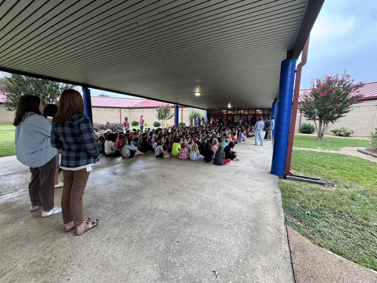 students sitting in a crowd 