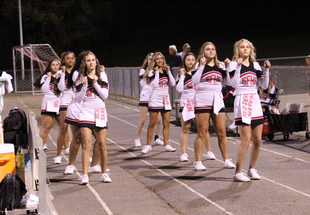 SFHS Cheerleaders leading a cheer during the Homecoming football game.