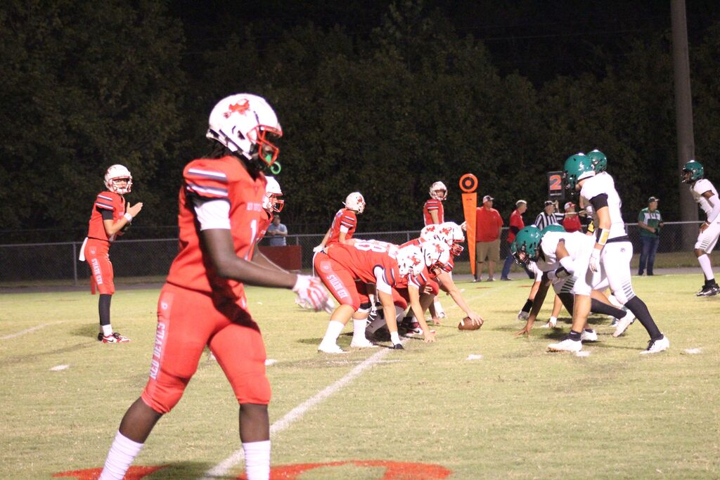 South Fulton football players line up against Ballard County football players during game.