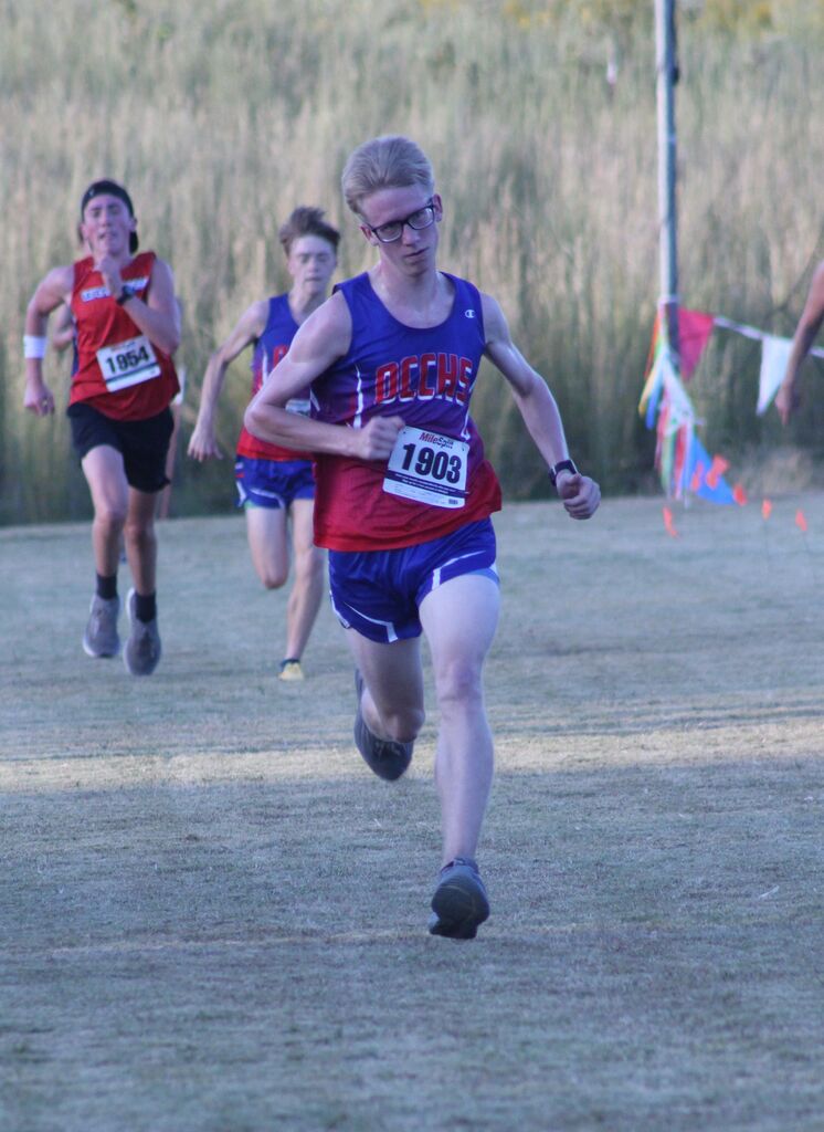 OCCHS Boys' Cross-Country runner completing the race.