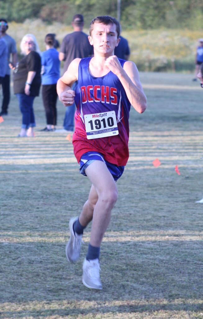 OCCHS Boys' Cross-Country runner completing the race.