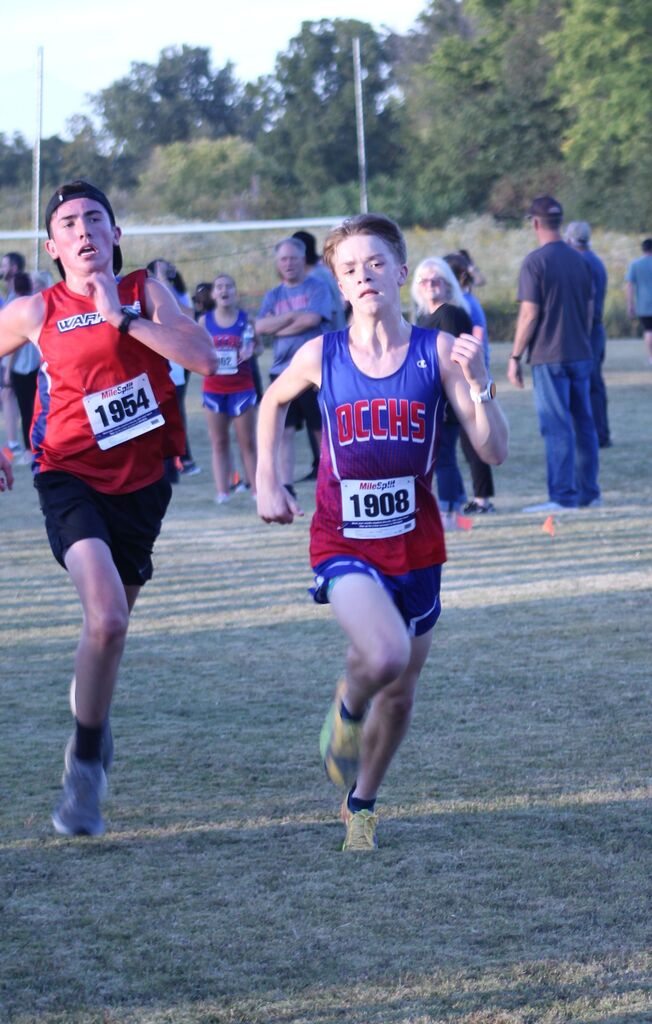 OCCHS Boys' Cross-Country runner completing the race.