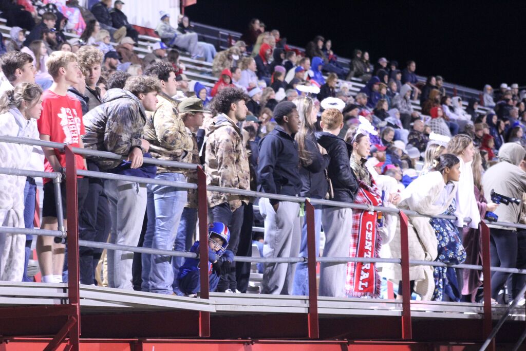 OCCHS students watch the homecoming football game from the stands.