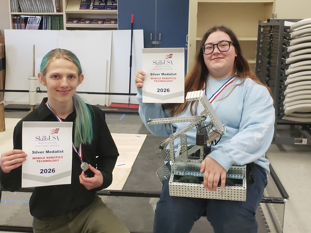 Malcolm Knox and Airabella Ahlers with their Silver Medals