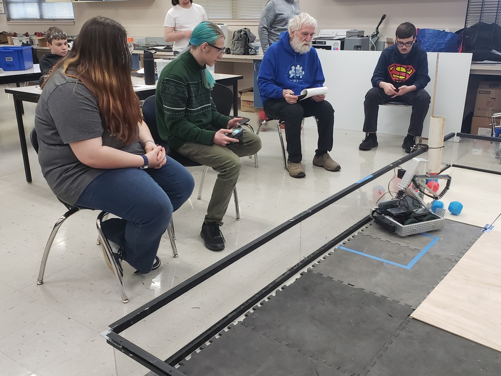 Malcolm Knox and Airabella Ahlers competing with their robot