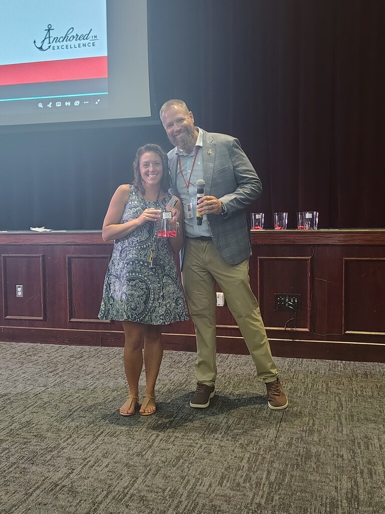 superintendent and teacher winner for raffle