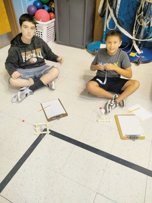 Sixth Graders Doing a Catapult Science Project