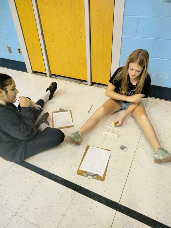 Sixth Graders Doing a Catapult Science Project