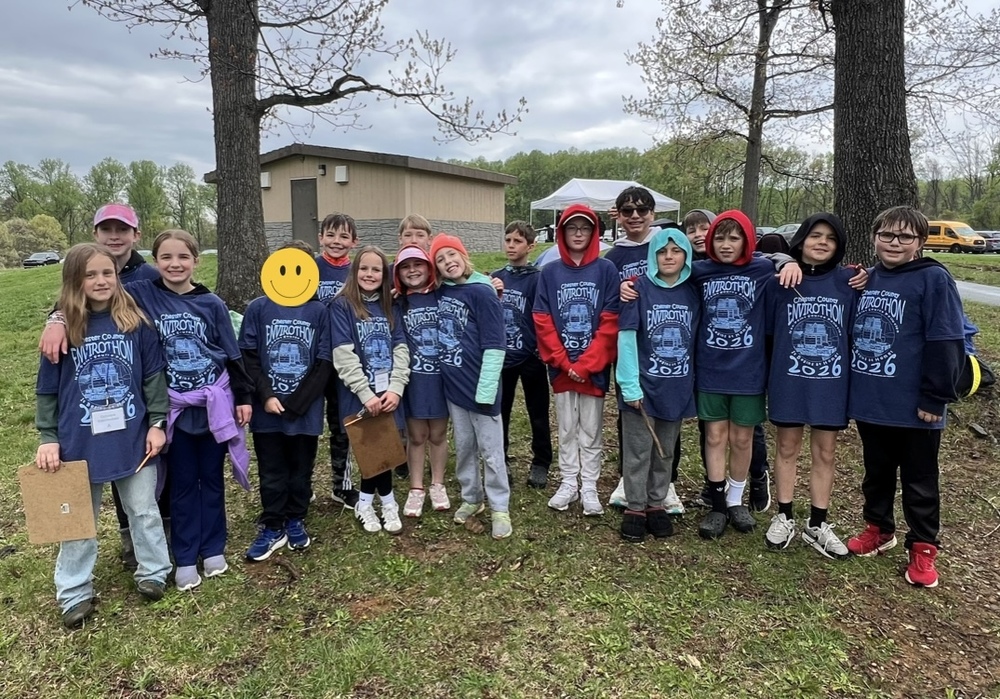 students stand together and smile at the envirothon 