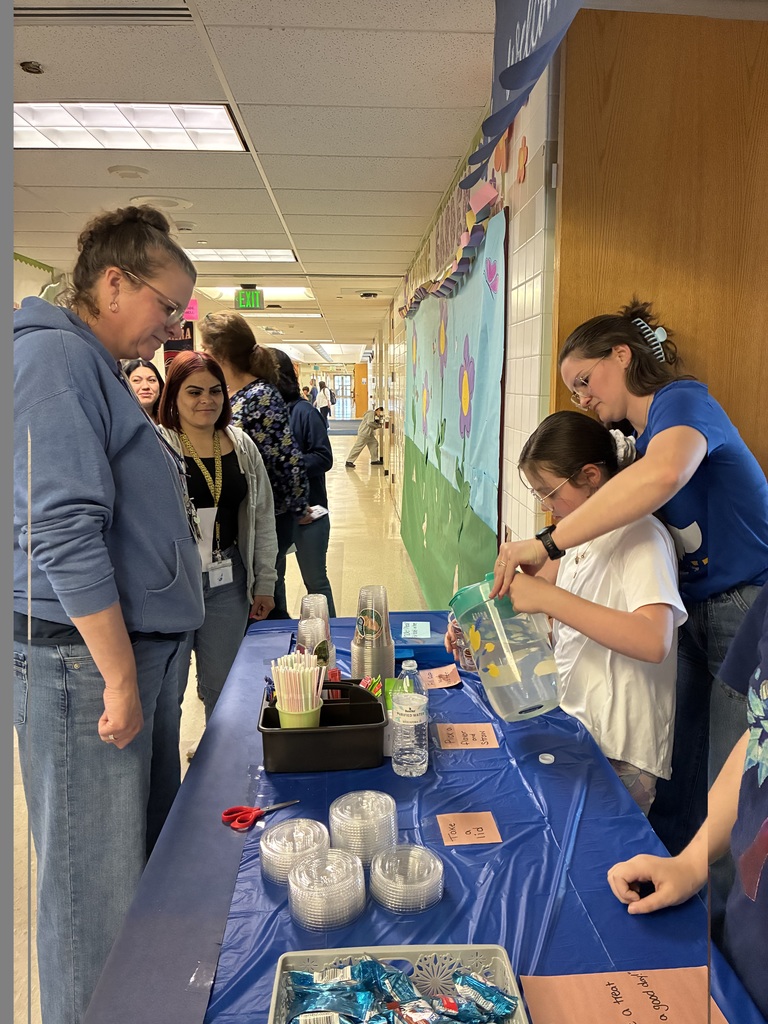 students work together at The Blue Cafe, learning new skills