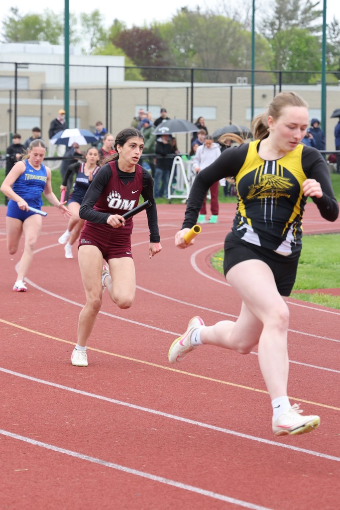 students running on track