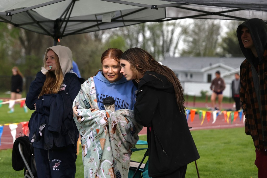 students under awning 