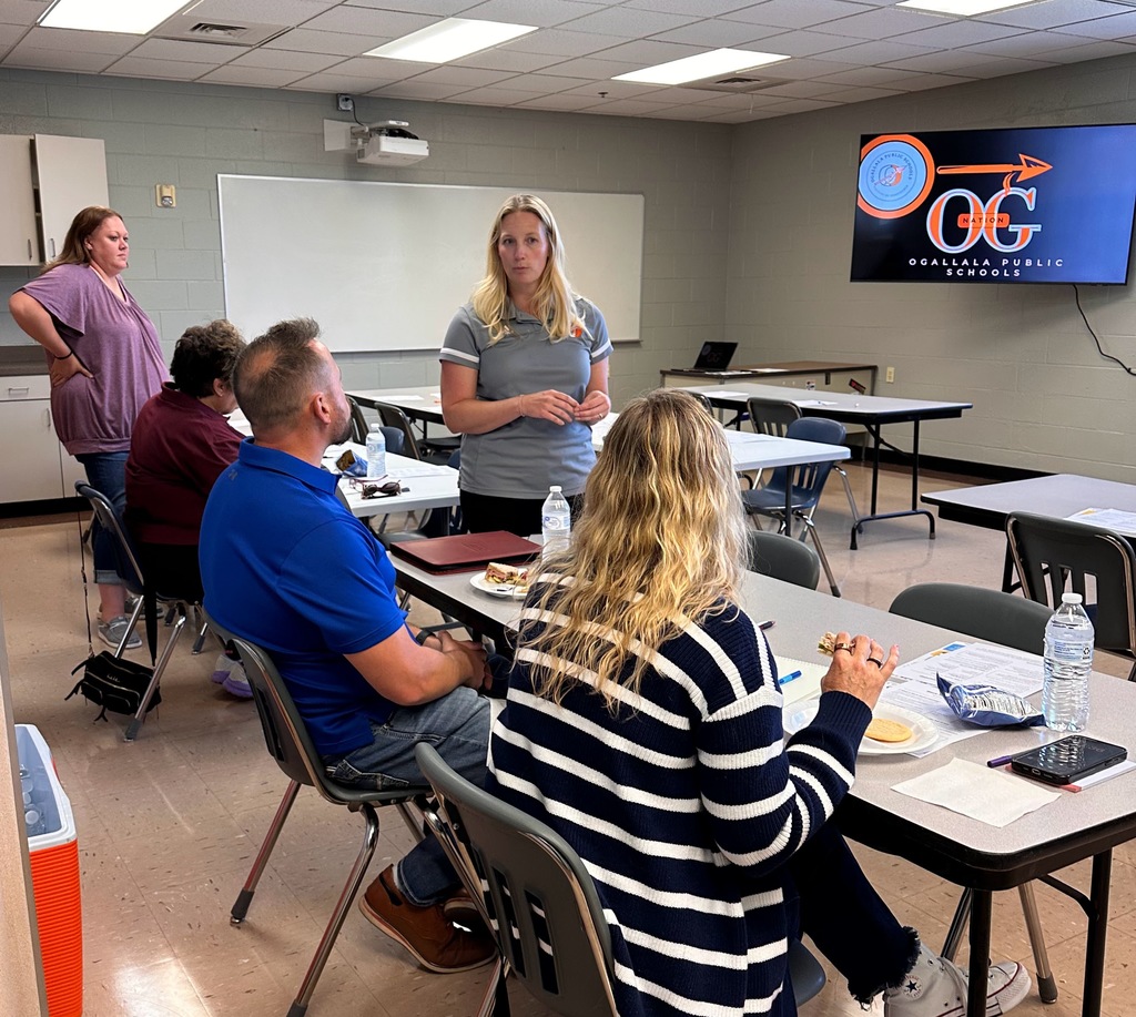 OHS staff talking to local business leaders.