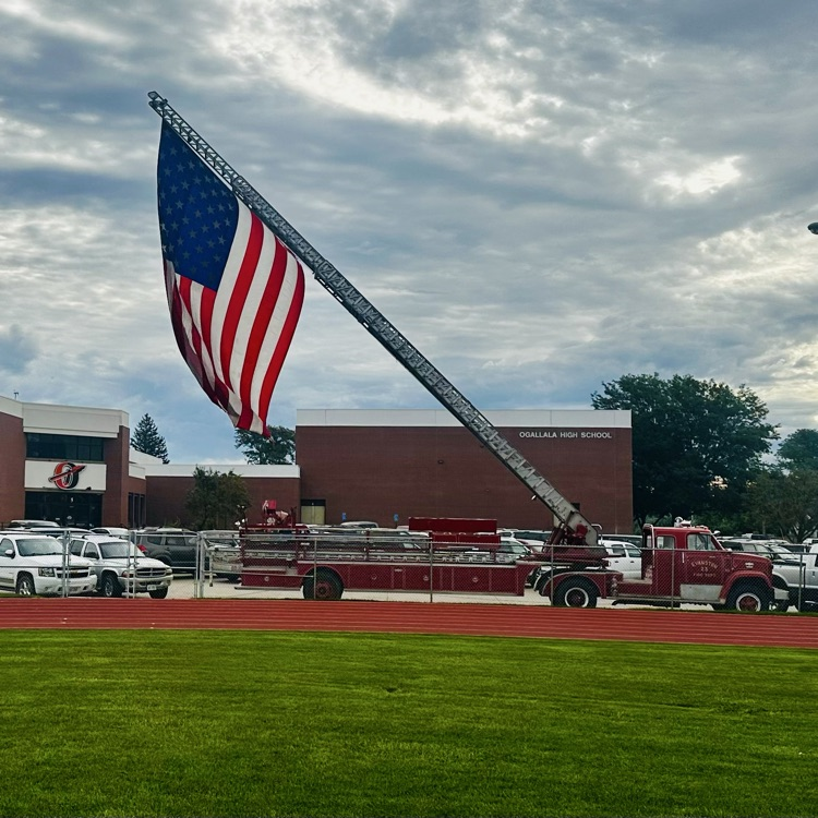 flag hanging from fire truck 
