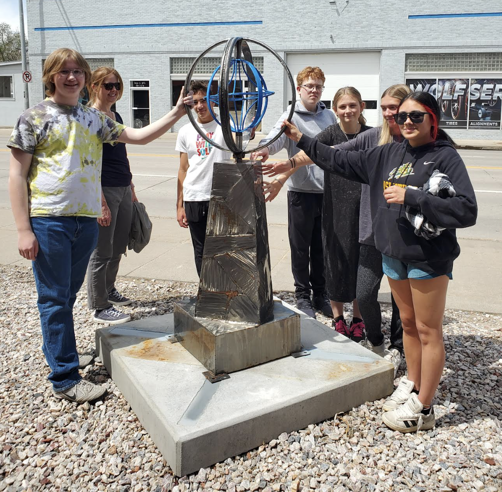 students on a sculpture walk