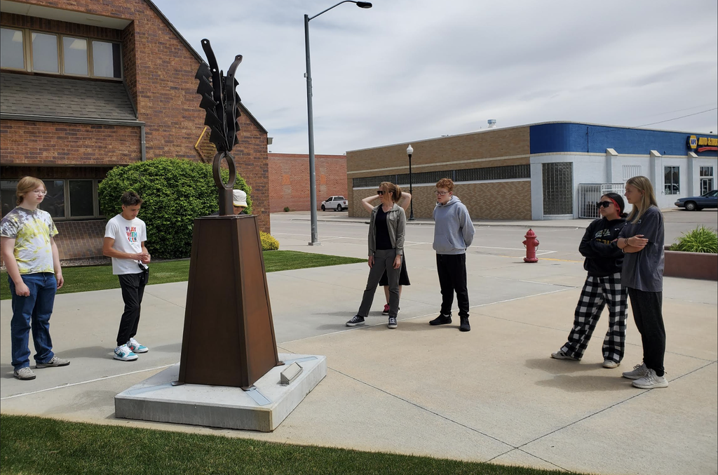 students on a sculpture walk