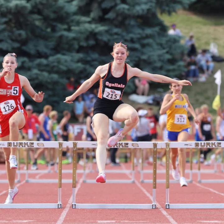 Shaydyn Rasby running hurdles