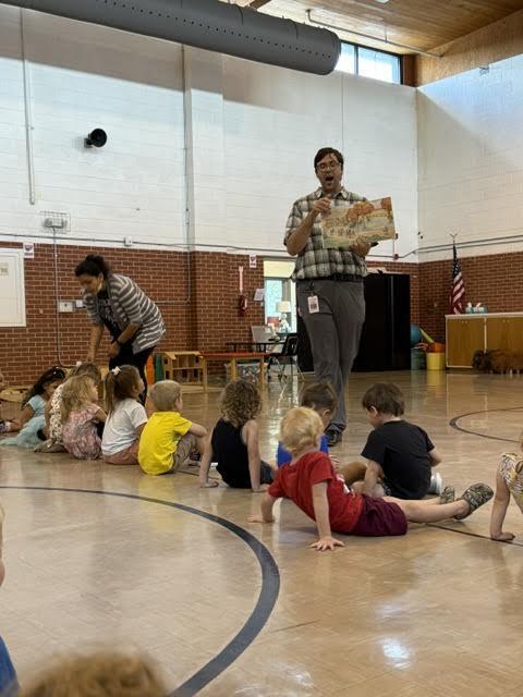 music teacher with a book