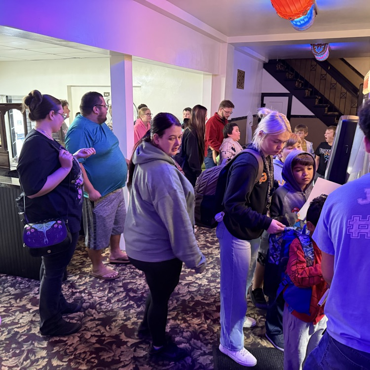 students at movie theatre 